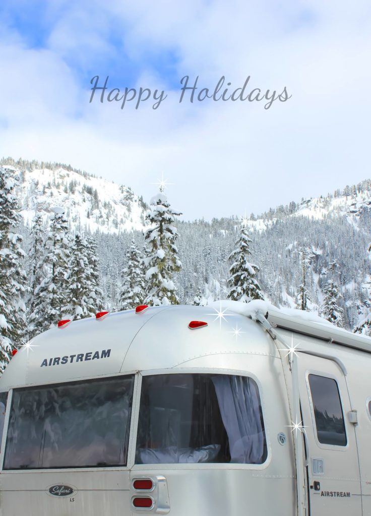Airstream Travel Trailer in snow covered mountains