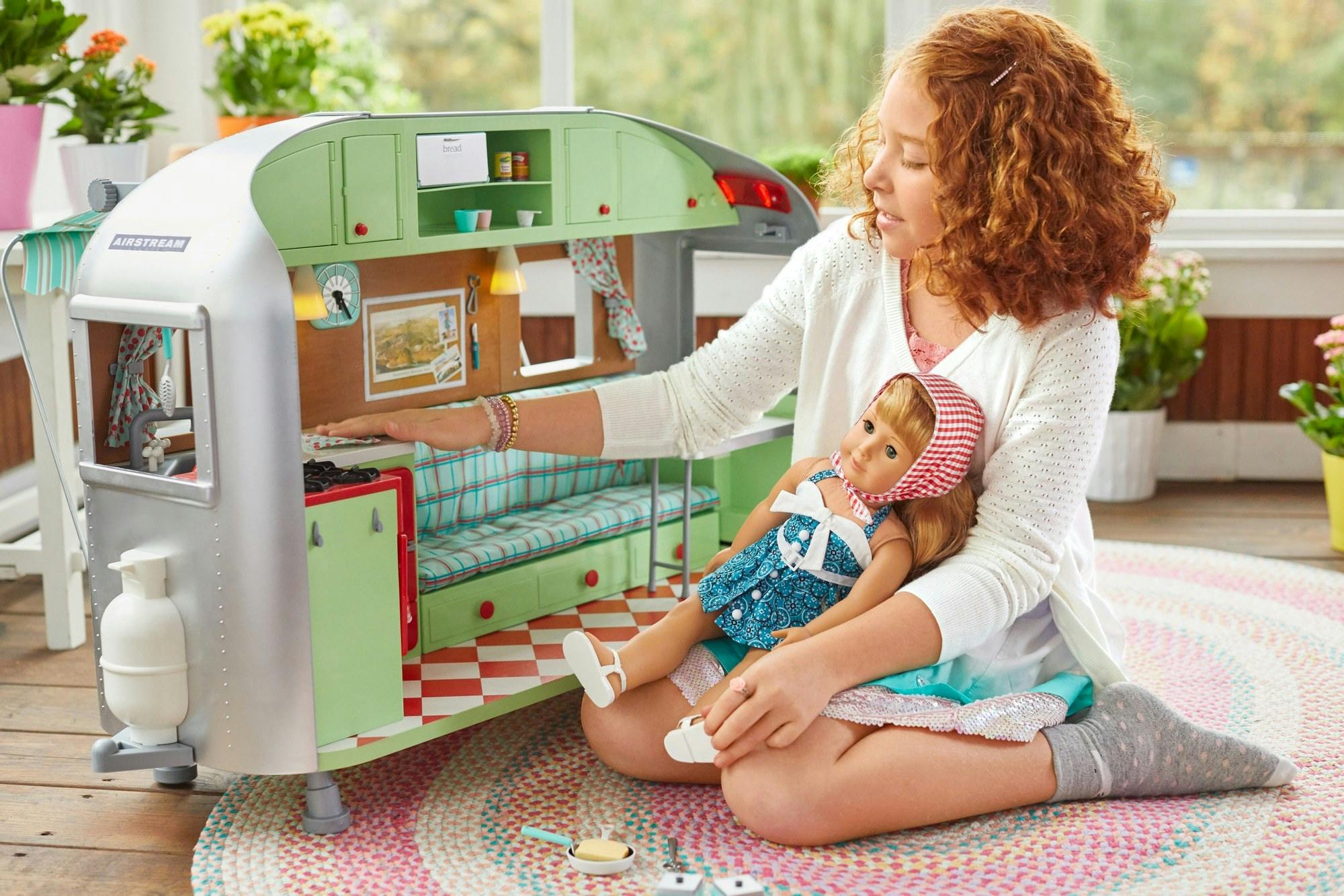 American Girl and Airstream Travel Trailer