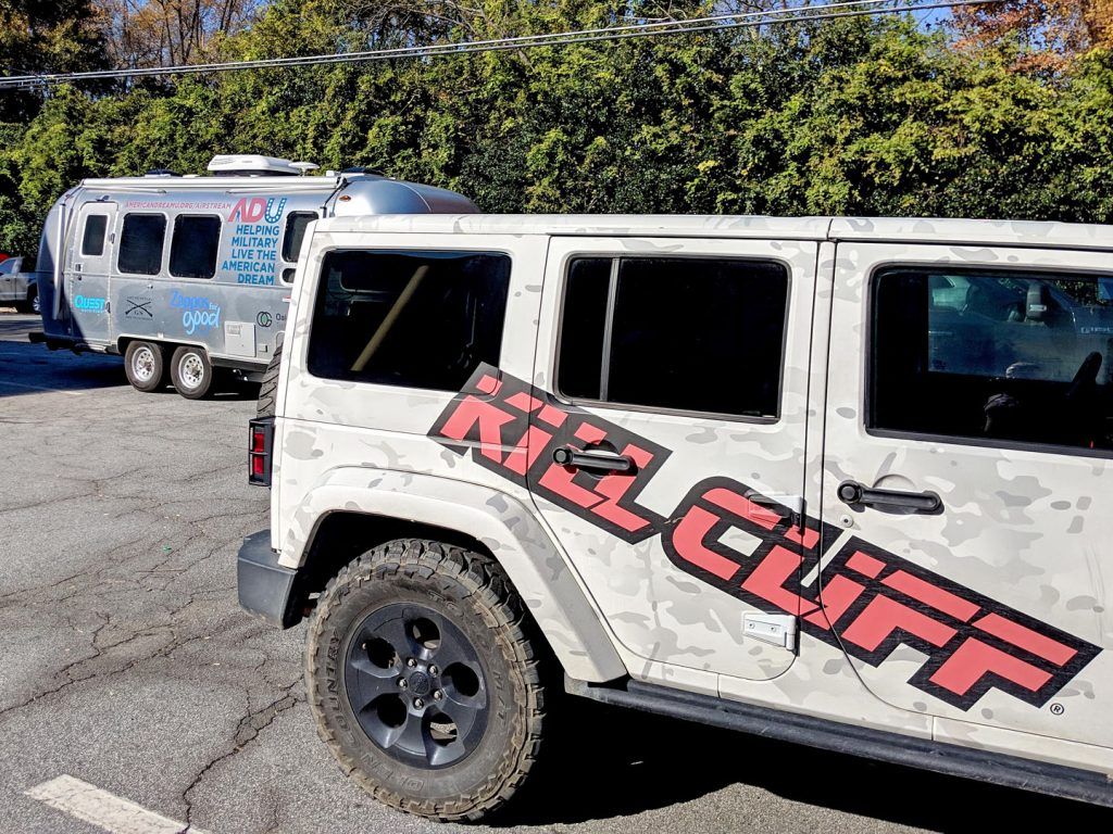 Airstream Travel Trailer and White Jeep