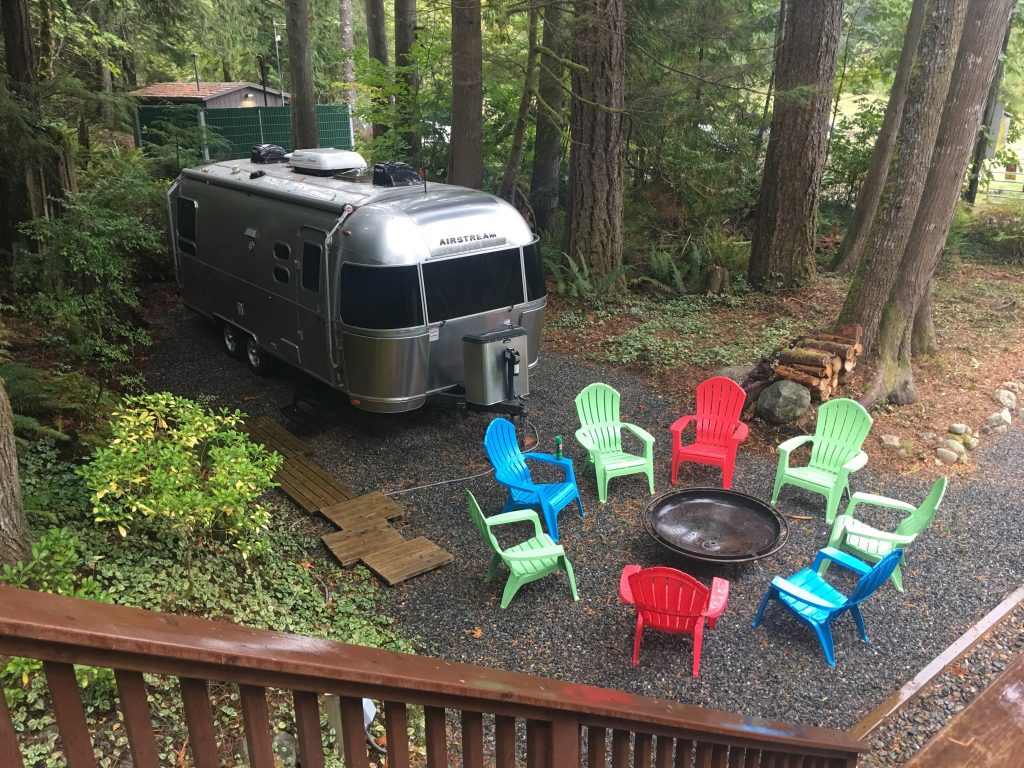 Travel Trailer and Campfire