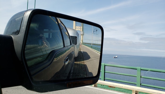 Airstream Travel Trailer in Rear View Mirror
