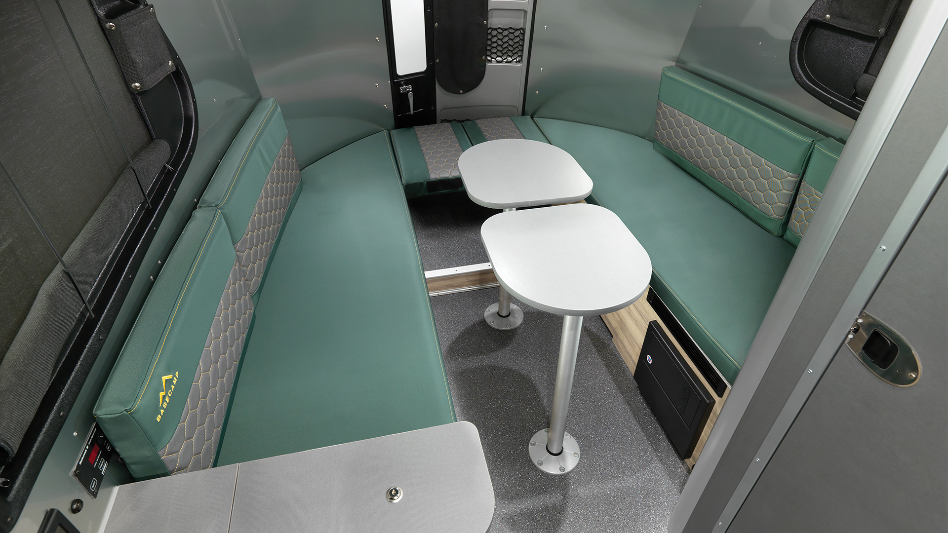 Airstream-Basecamp-Forest-Ridge-Two-Tables-Up-Rear-Seat-Down