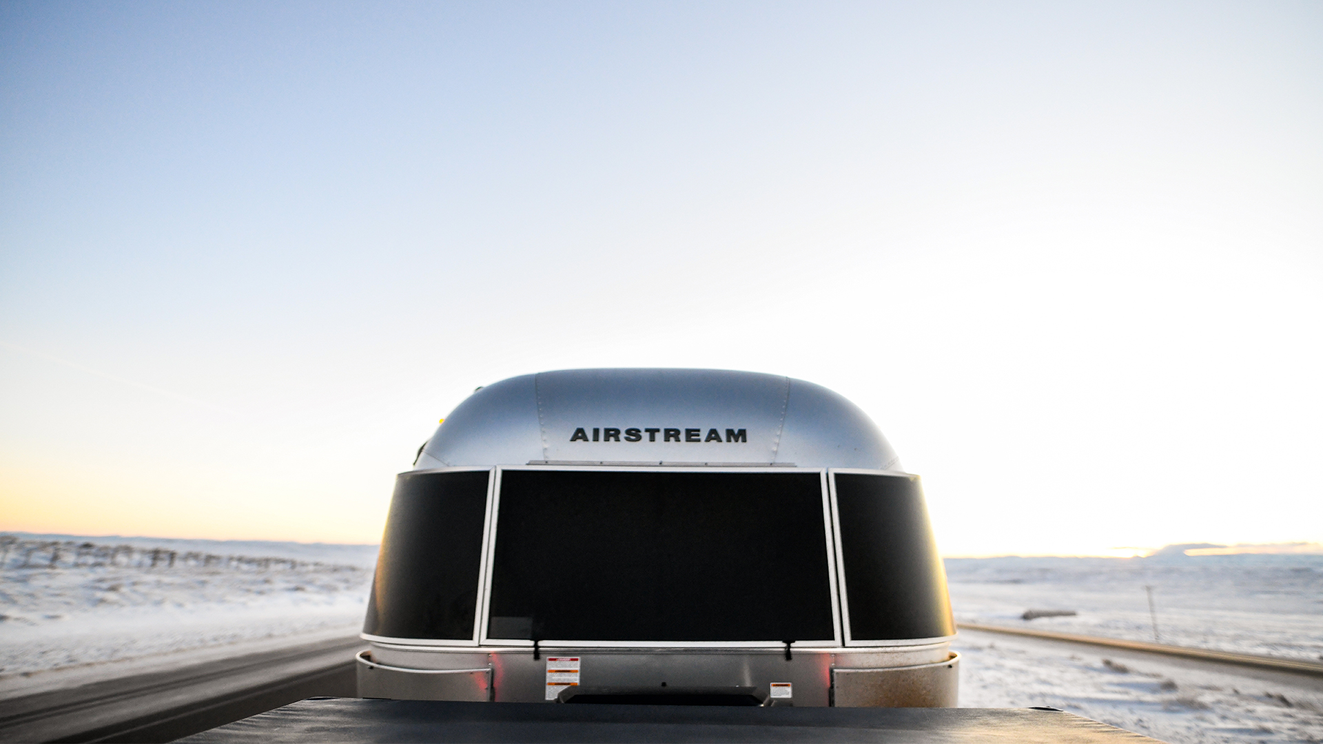 Airstream-Travel-Trailer-Towed-in-Winter