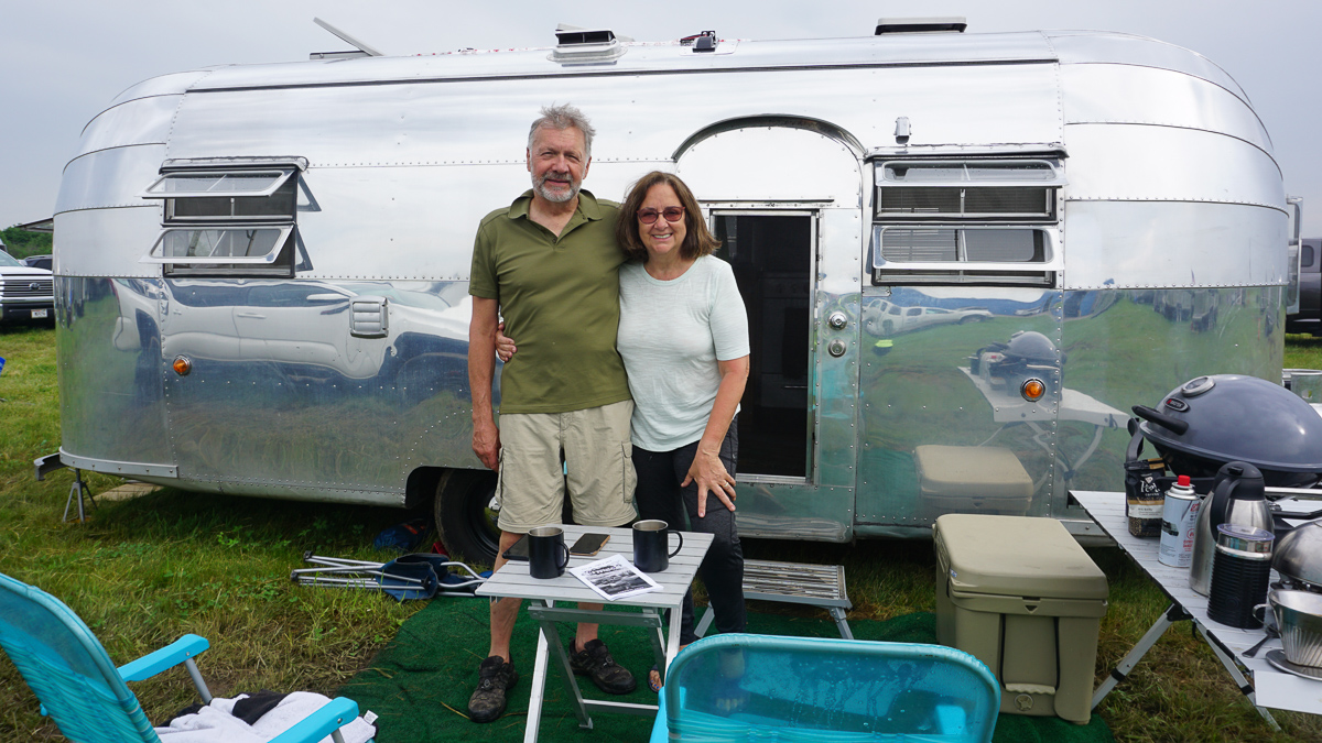 Paul and Lynda Schuepp with Airstream Travel Trailer