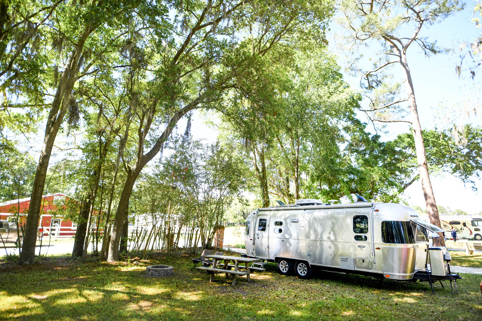 Airstream Travel Trailer RV Camper Trailer Set up at Campsite