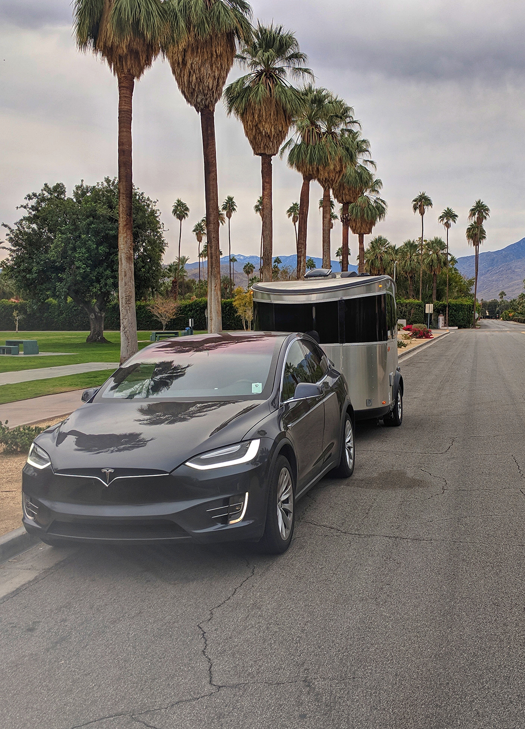 Airstream-Basecamp-and-Tesla-Model-X-on-Road