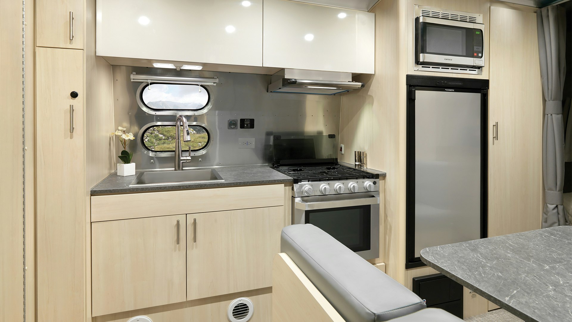 2021-Airstream-Flying-Cloud-23FB-Sunlit-Maple-Cabinetry-Storage-and-Kitchen-Seattle-Mist-Decor