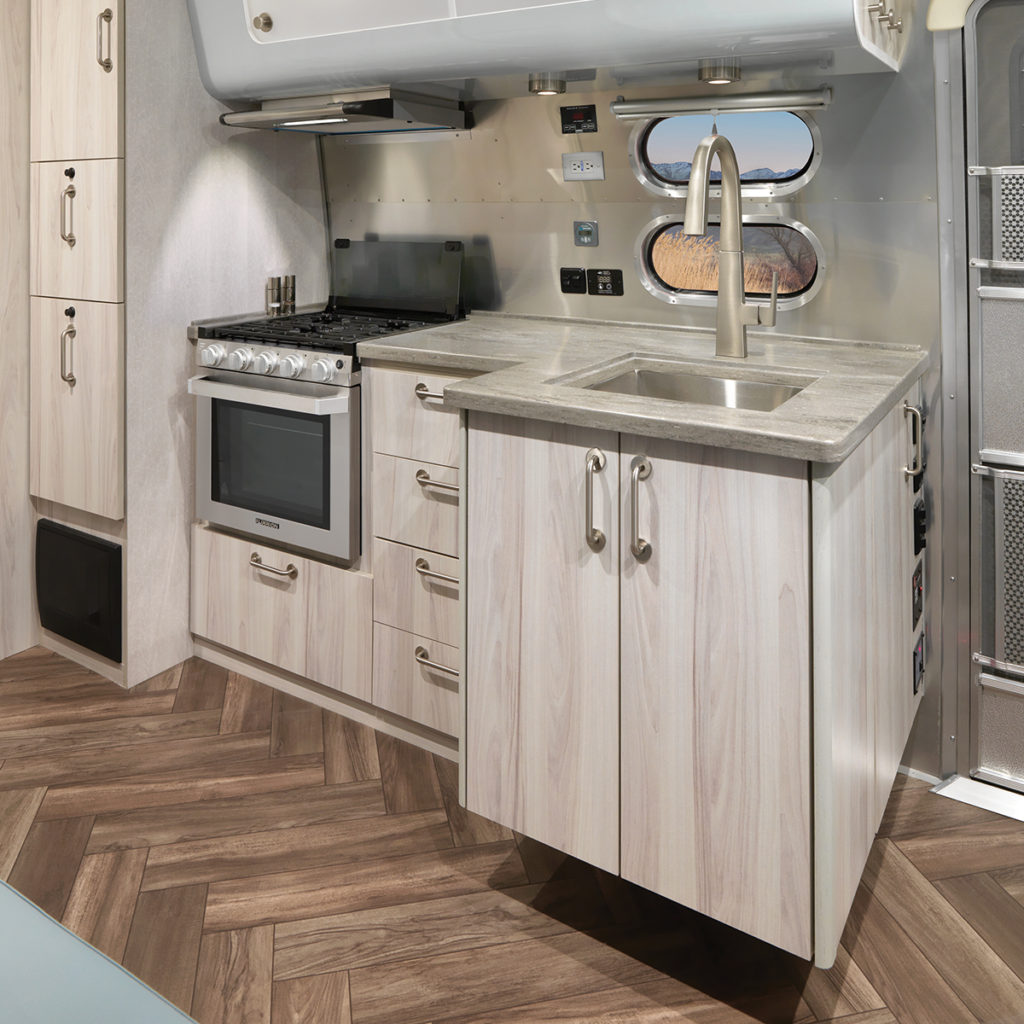 https://cdn.airstream.com/wp-content/uploads/2020/06/2021-Airstream-International-Travel-Trailer-Updated-Sink-Design-1024x1024.jpg