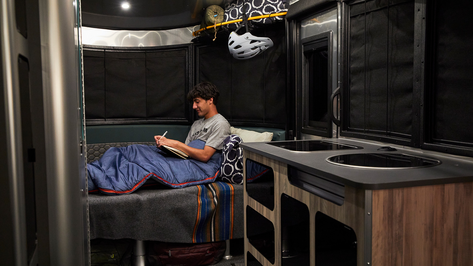 Airstream-Basecamp-20-Sleeping-Space-in-Front-Dinette-Conversion-Table