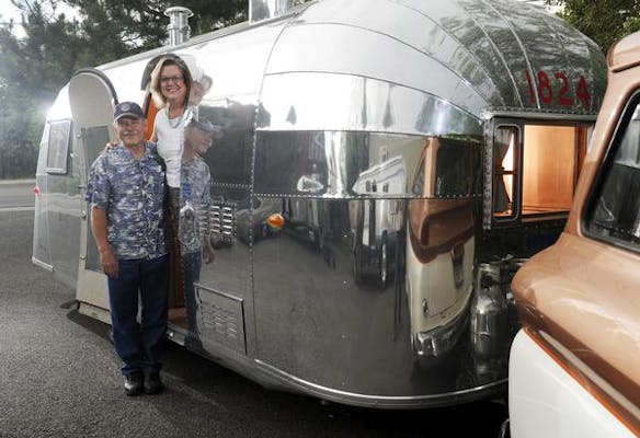 Shari  Rob Davis stand in the doorway of their restored  1956 Airstream  Safari  travel trailer on Friday, June, 15, 2012.  The Airstreams remain very popular.  Cyrus McCrimmon, The  Denver Post.
