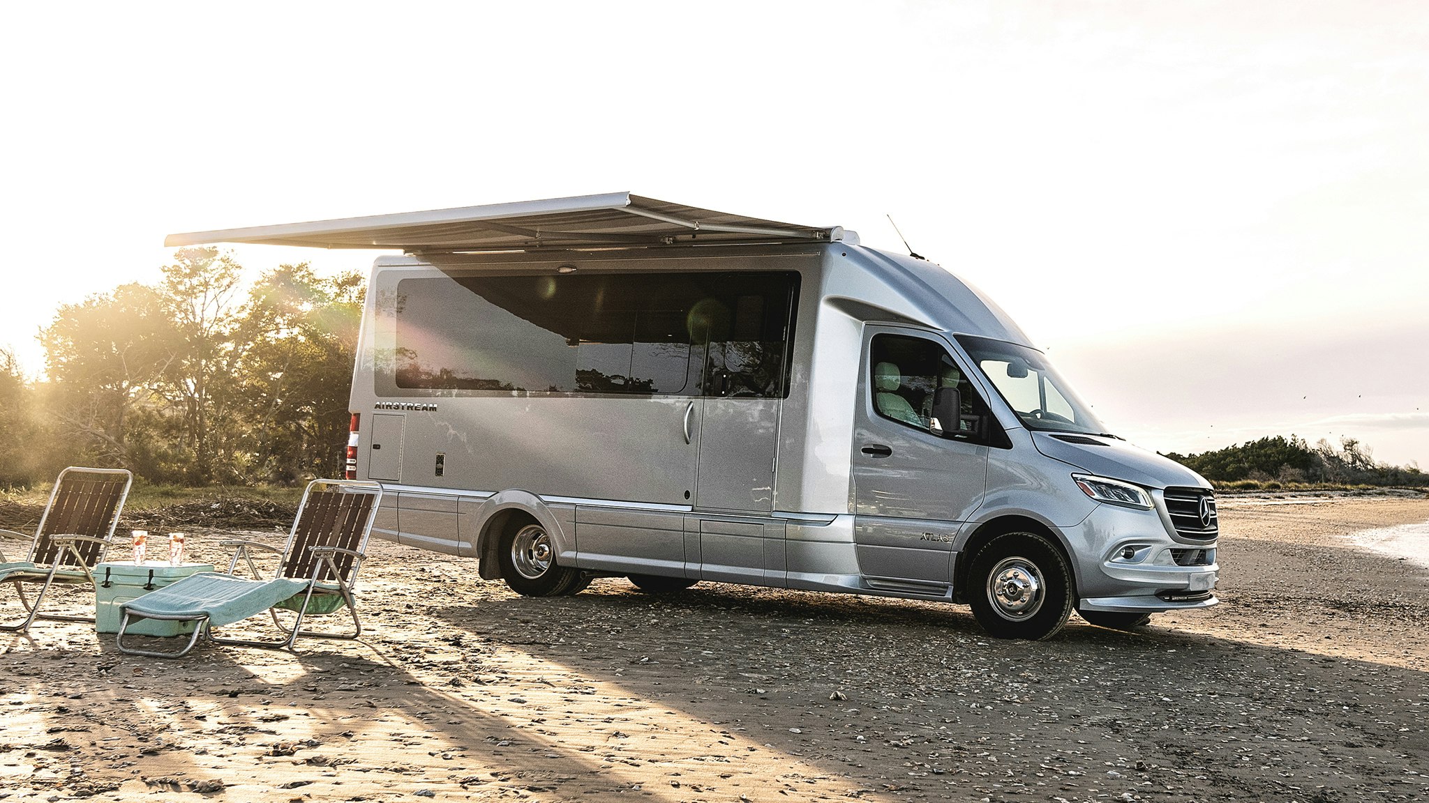 Touring Coach sitting on the beach