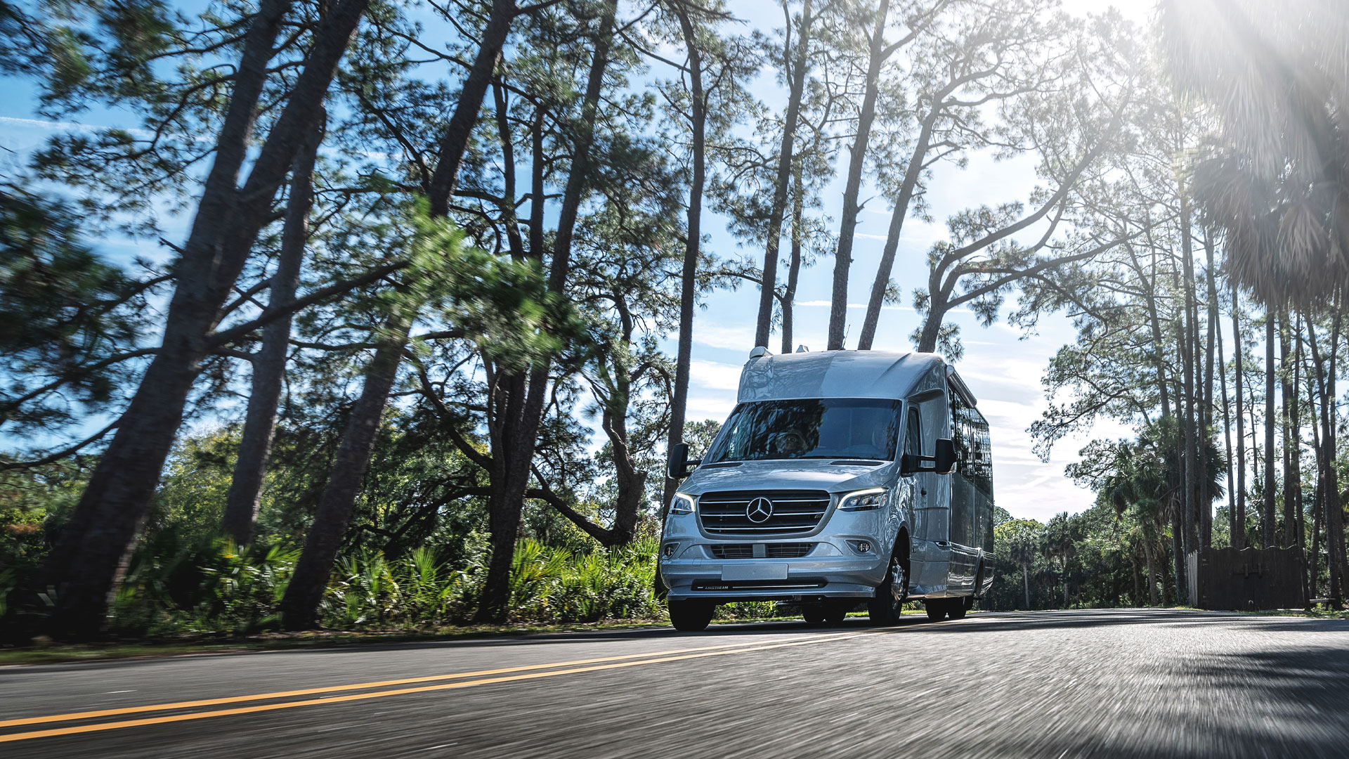 Airstream Atlas driving down the road