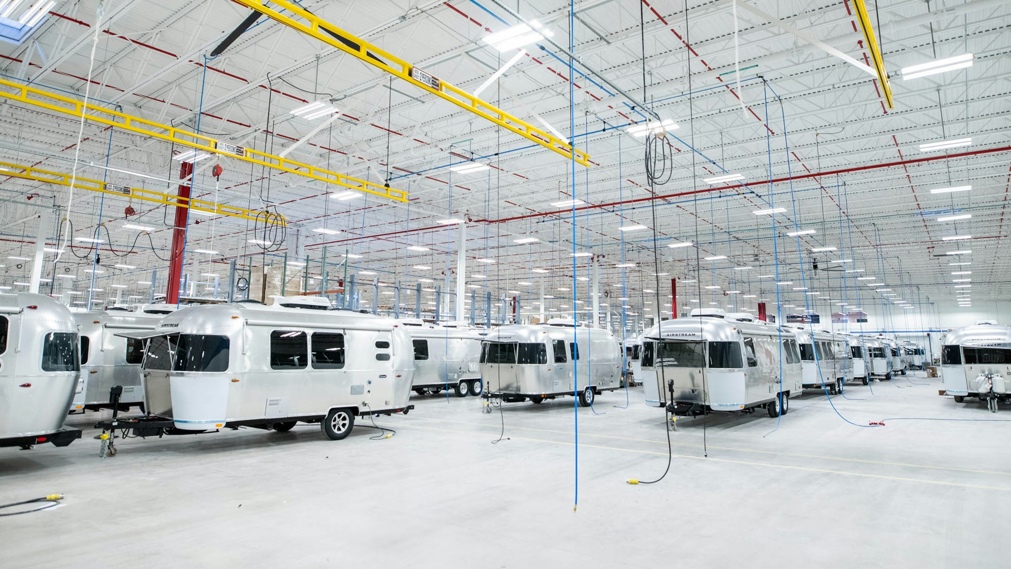 Airstream Travel Trailers lined up in the factory