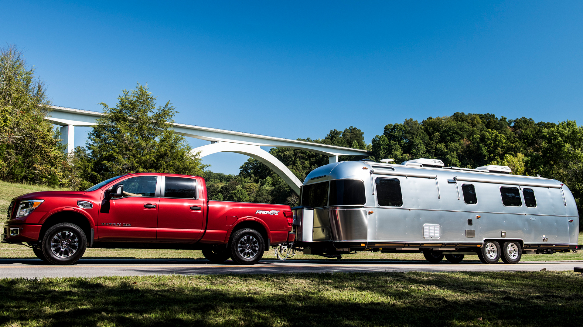 red-truck-towing-an-airstream-trailer