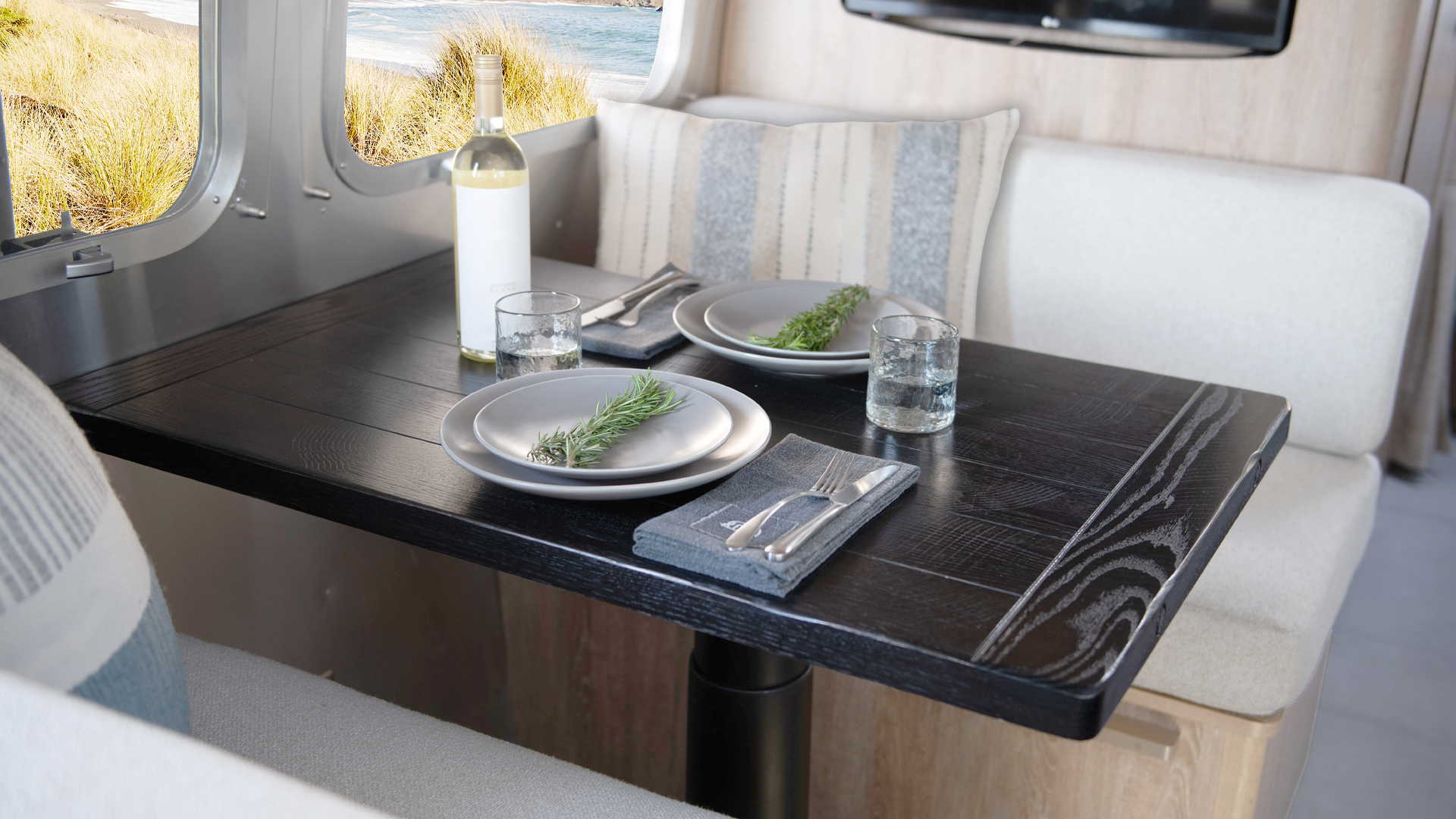 https://cdn.airstream.com/wp-content/uploads/2021/06/Airstream-X-Pottery-Barn-Dinette-Wood-Table-1.jpg