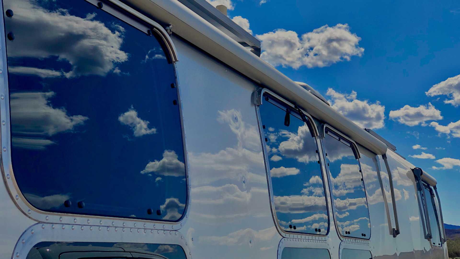 Sky reflecting in Airstream windows