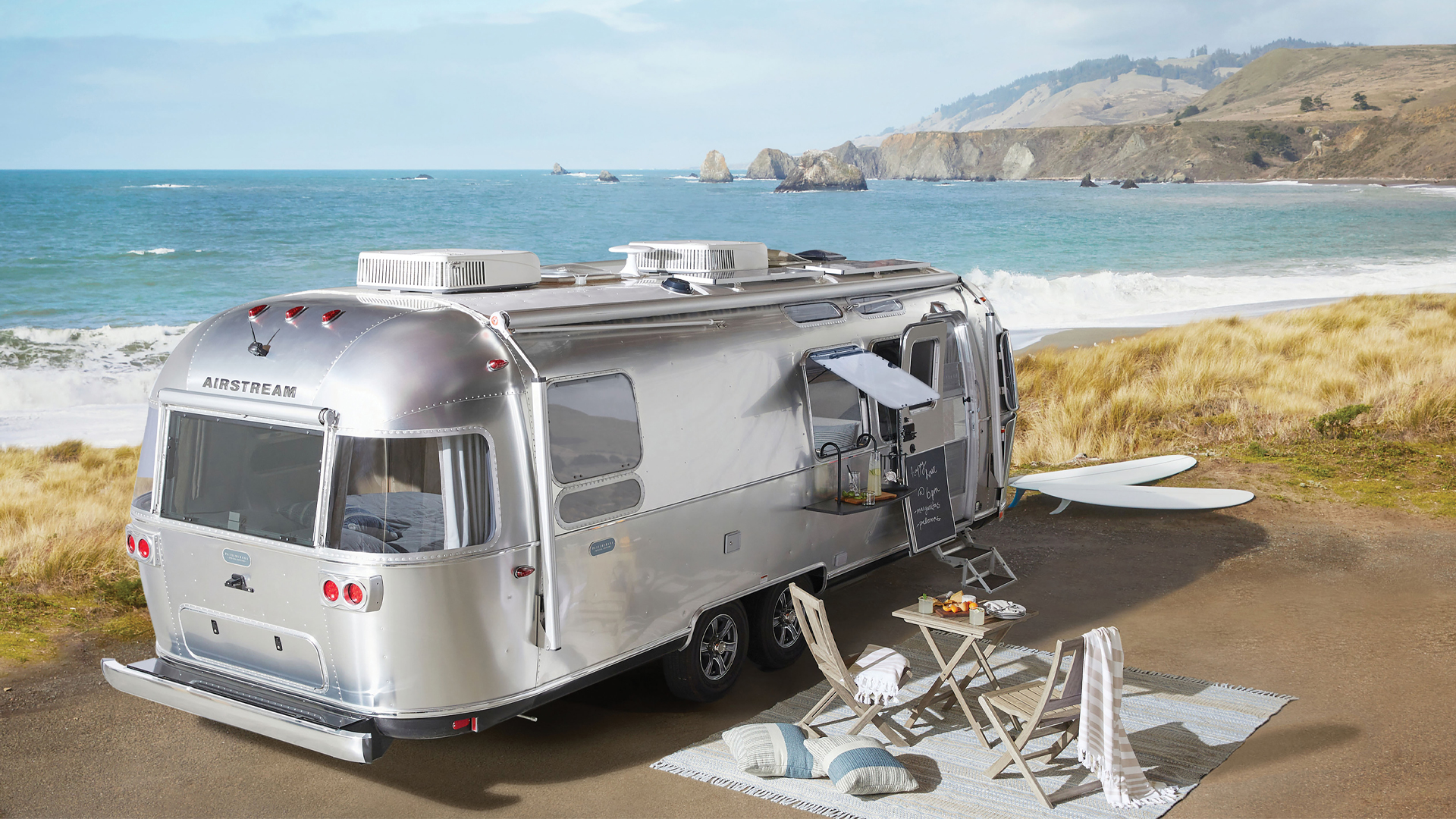 Airstream-Pottery-Barn-Travel-Trailer-sitting-on-the-beach