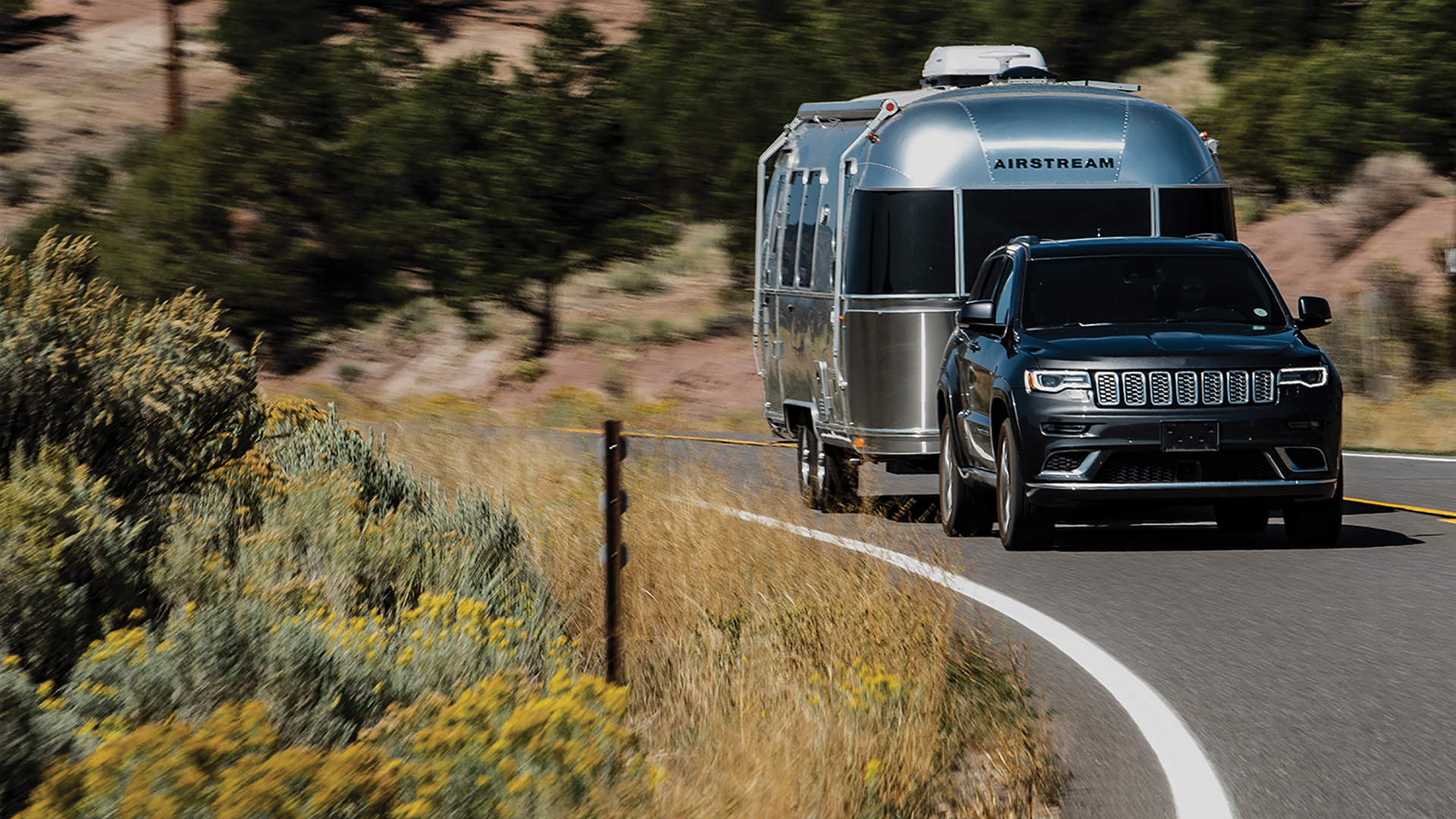 Airstream-Travel-Trailer-going-around-a-curve