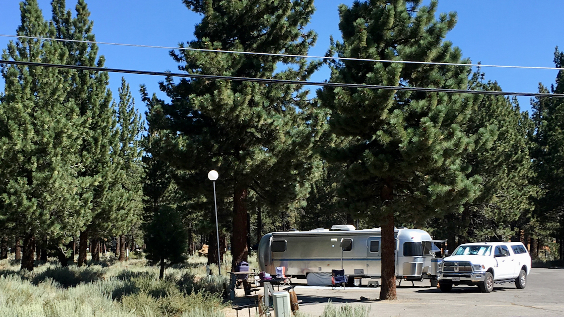Airstream travel trailer parked at campground