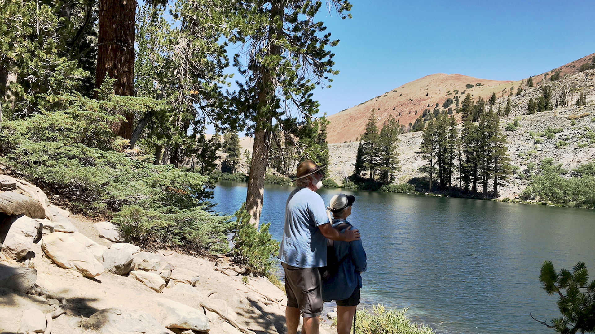 Jim and Carmen looking out at a river