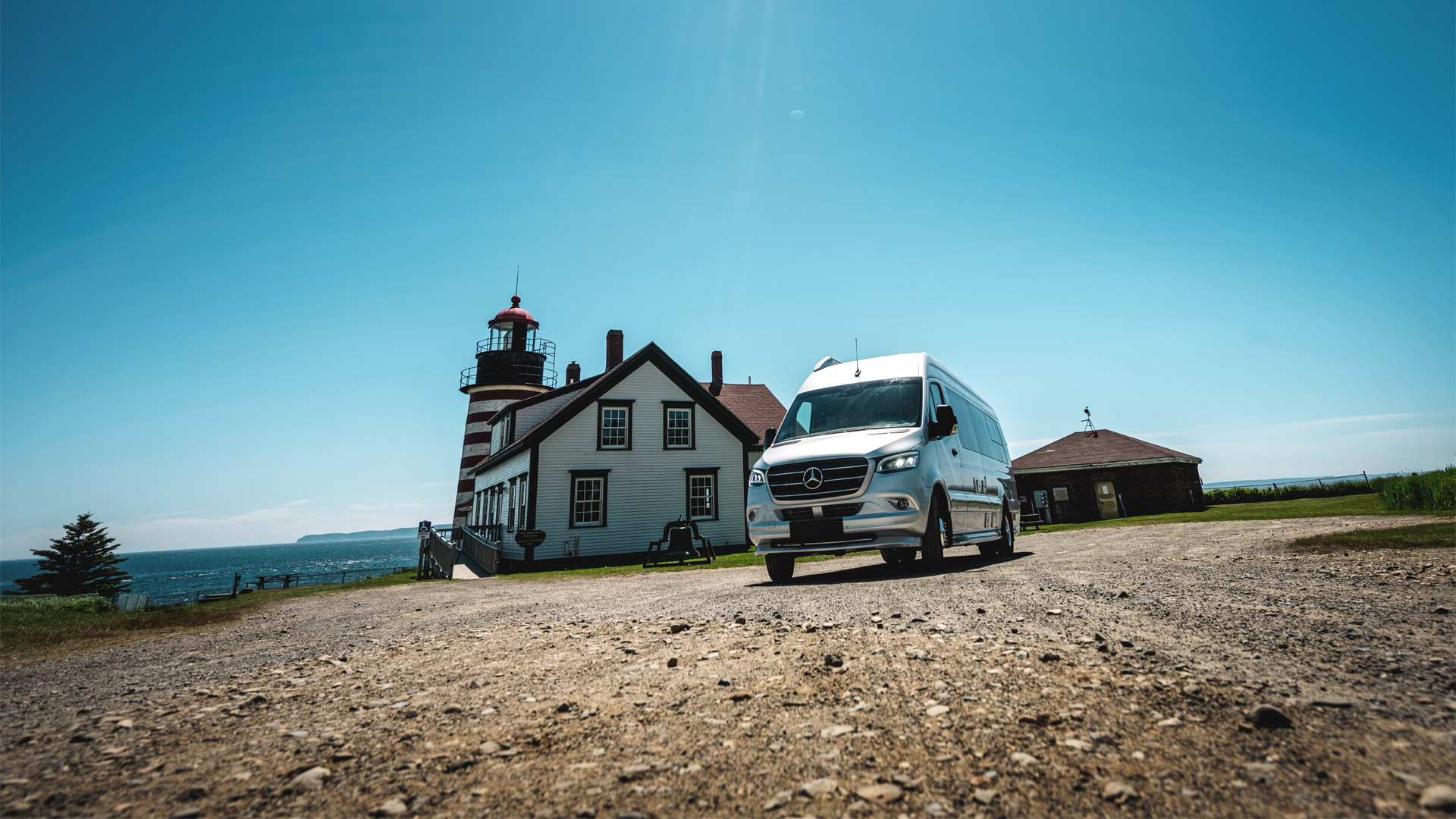 Airstream Interstate Touring Coach driving down a lane