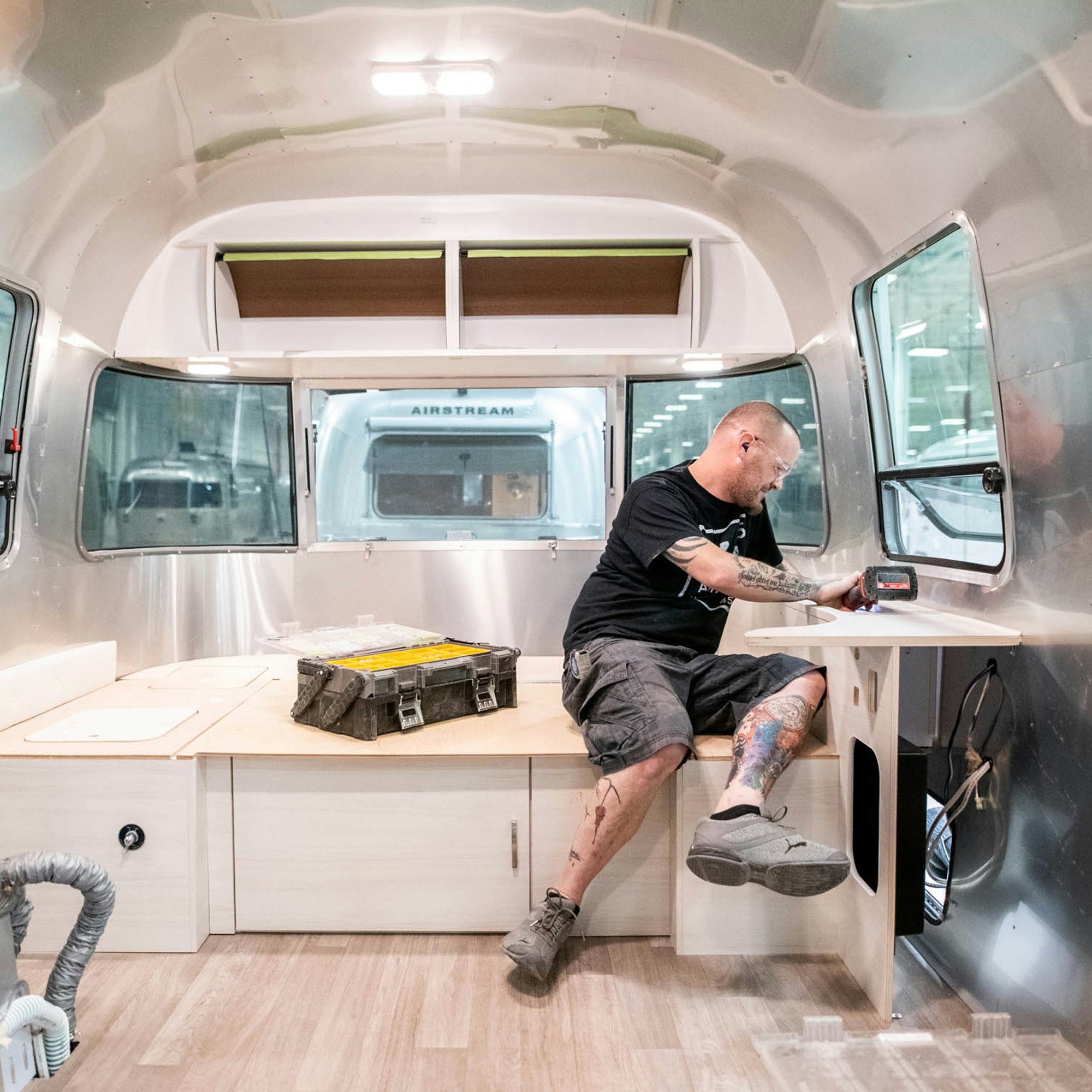 Airstream employee working on building the interior of an Airstream Travel Trailer