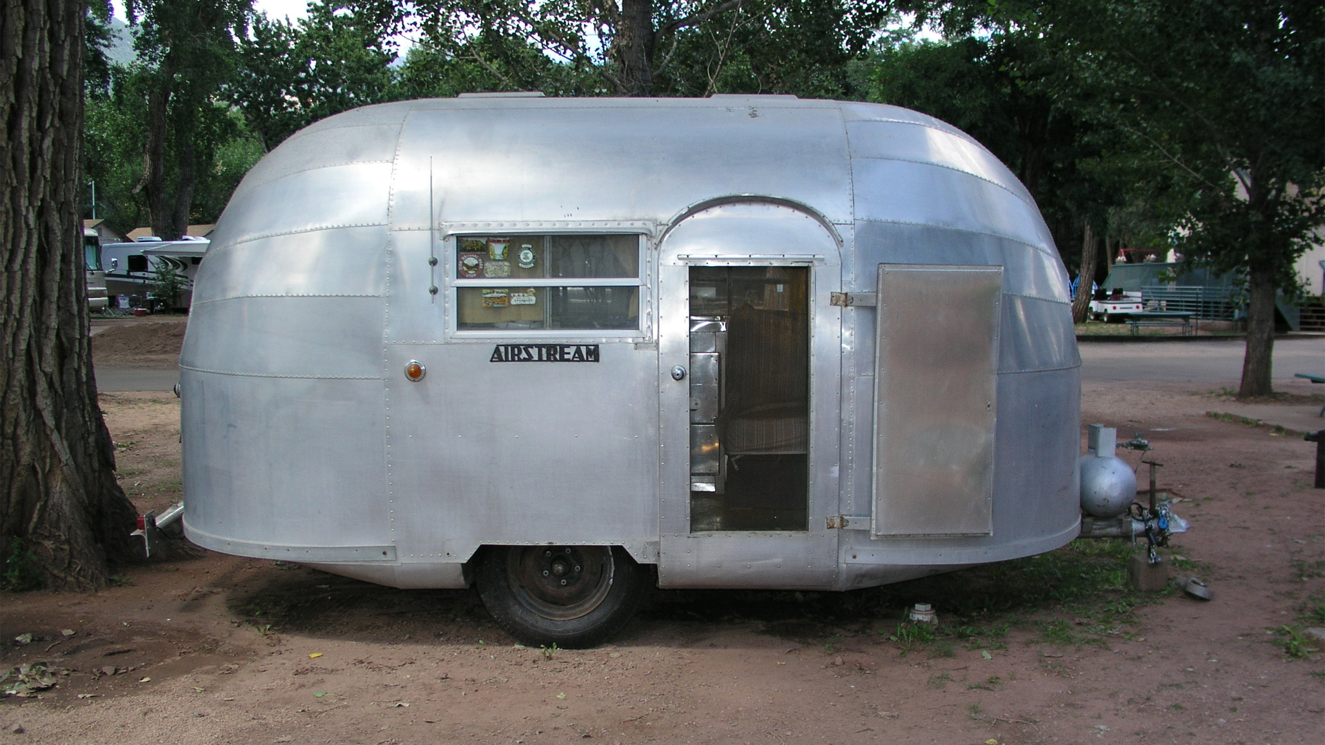 Airstream Vintage Wee Wind named Ruby sitting outside