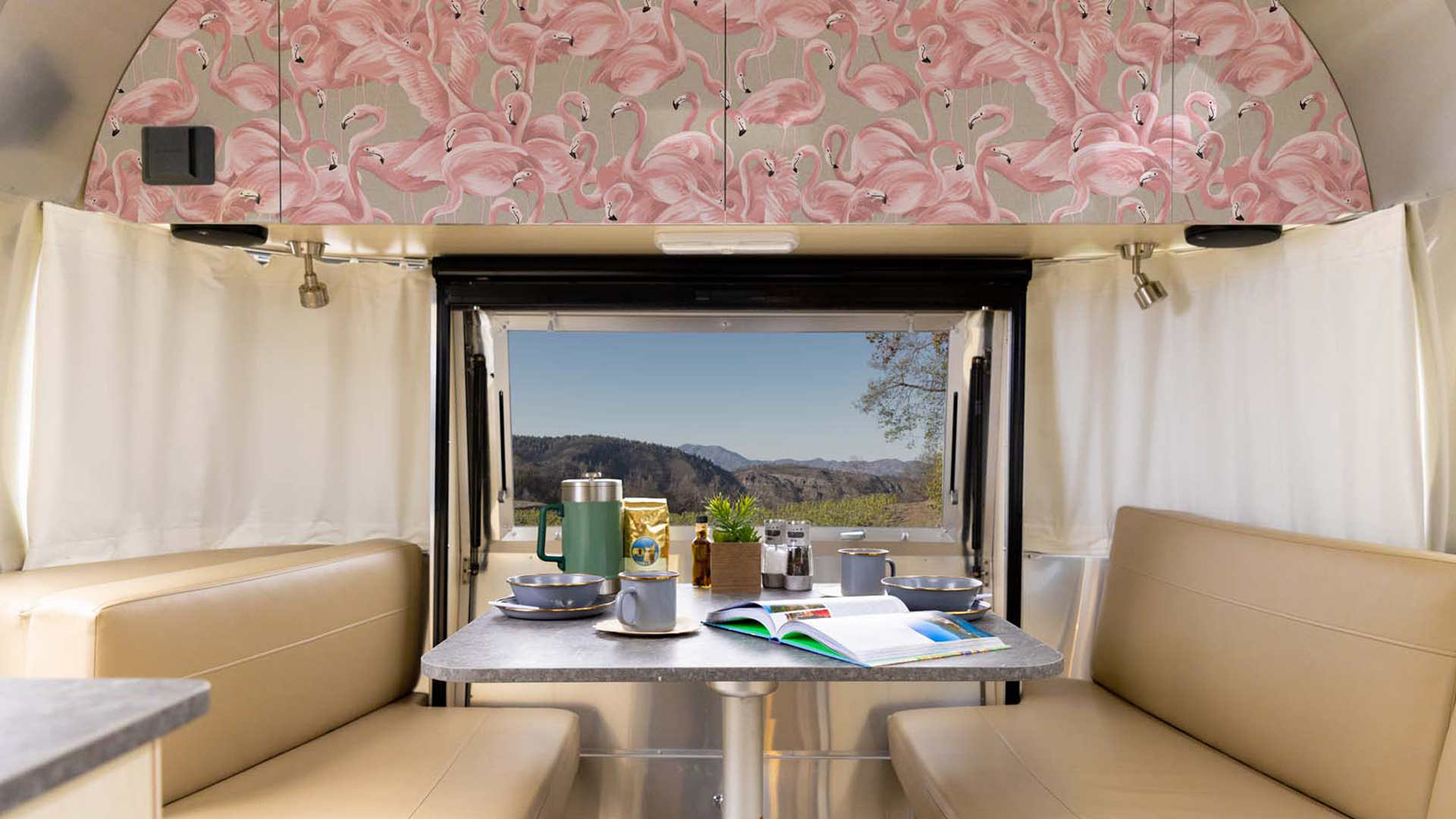Flamingo printed tempaper installed in the galley of an Airstream travel trailer