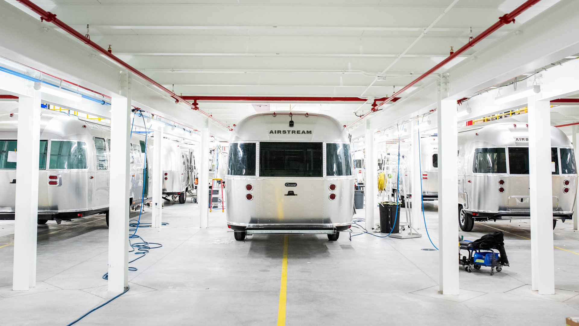 Three Airstream Travel Trailers sitting on the line at the Travel Trailer plant at Airstream Headquarters in Jackson Center, Ohio while they are being built.