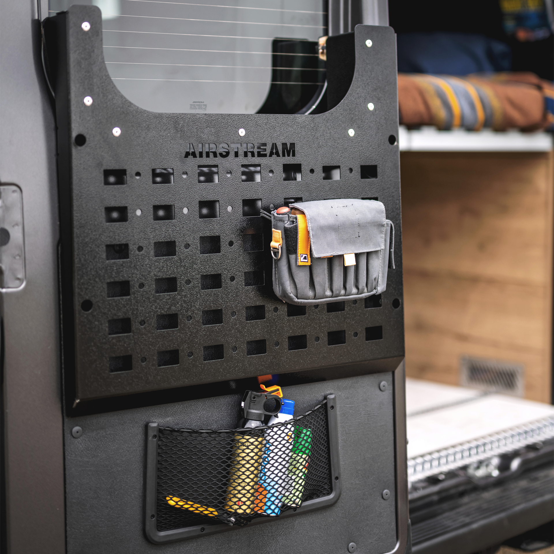 MOLLE panels located in the rear doors of the Airstream Rangeline Class B