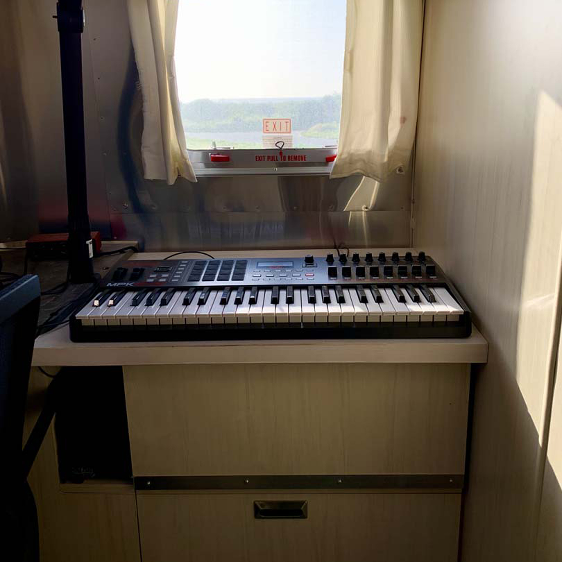 A space in the Flying Cloud Office camper made as a spot for a keyboard.