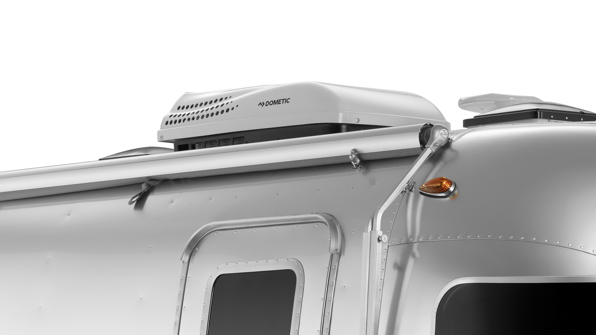 An air conditioner on the roof of an Airstream Bambi travel trailer