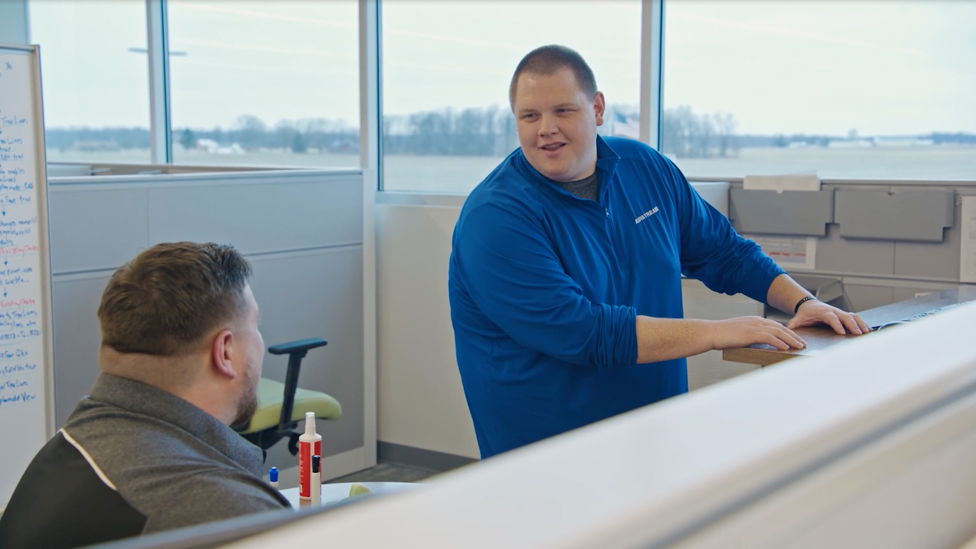 Two Airstream employees work together to build apps to improve Airstream quality.