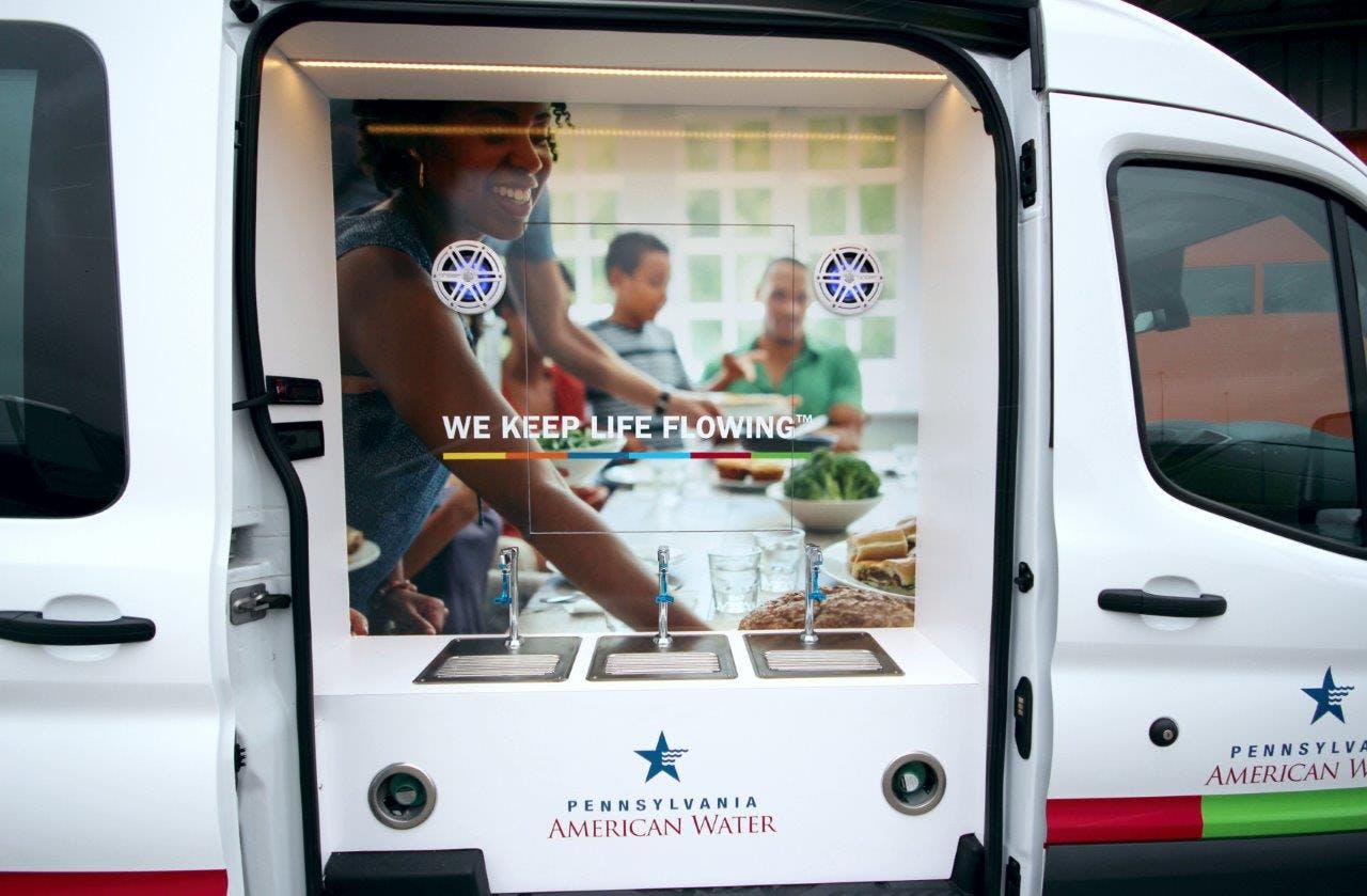 2ford_transit_mobile_hydration_vehicle_custom_water_spouts_custom_speakers1