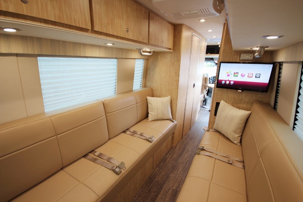 Luxury_Sprinter_Conversion_Custom_Sofa_Smart_TV